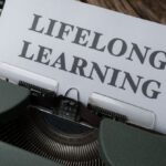 Lifelong Learning - A typewriter with the word long life learning on it