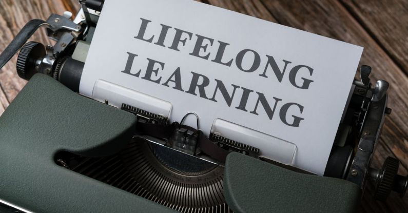 Lifelong Learning - A typewriter with the word long life learning on it