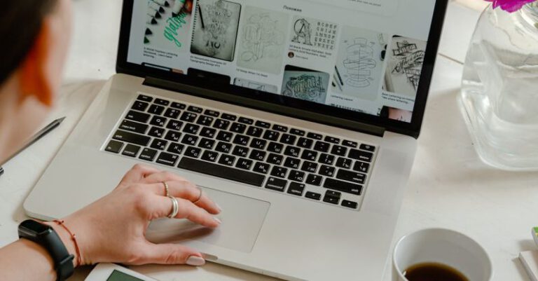 Volunteering Experience - Person Using Macbook Pro on Table