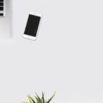 Workspace - White Smartphone Beside Silver Laptop Computer