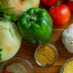 Groceries - Assorted Vegetables and Spices on Wood Surface