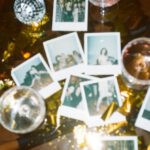 Travel Memories - Wine Glasses And Pictures On Table