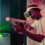 Video Game Industry - Man in White Shirt Holding Brown Pipe